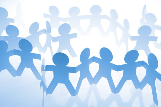Team holding hands united