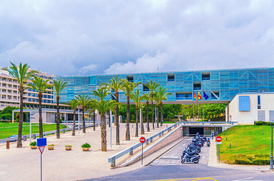 Ajuntament de Benidorm City Hall building on square with palms in L'Aiguera Parc Park in Old town Benidorm city centre in summer day, Benidorm Town Hall floorscraper, Valencian Community, Spain