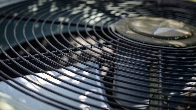 Industrial AC Fan Grille: Close-Up View of Outdoor Air Conditioning Unit Vent