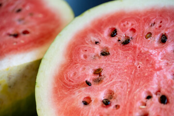 close-up of ripe, cut watermelon with pink gradient and seeds. heirloom fruit banner © mailcaroline