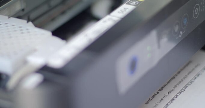 Close up detail of inside working printer while printing