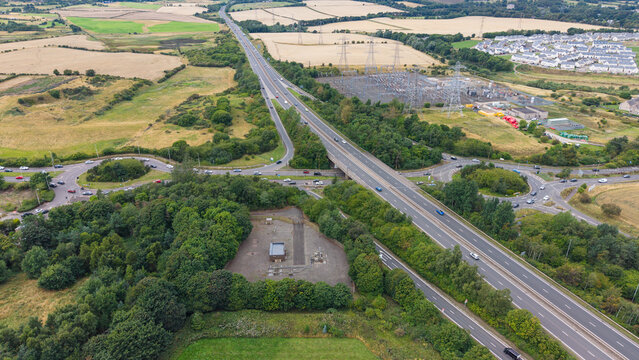 Bird's-eye view of Straiton Junction roundabouts and A720 Edinburgh City Bypass road infrastructure in Scotland
