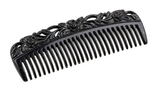 Black vintage hair comb with intricate floral rose carvings for elegant gala styling.