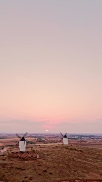 Iconic don quixote windmills at sunset in la mancha, spain