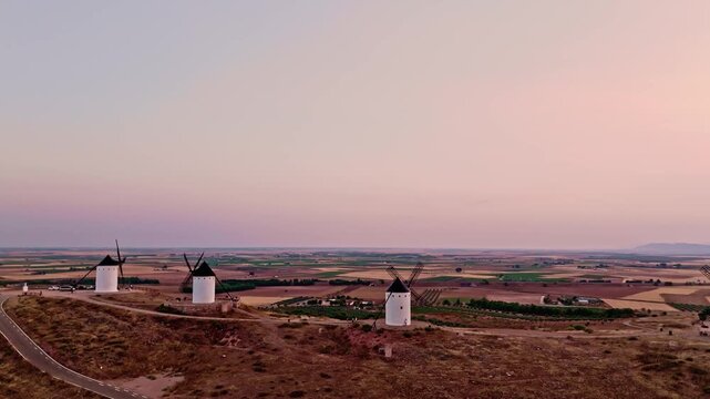 Aerial view of don quixote windmills at sunset in spain