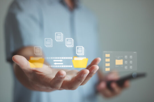 Businessman using smartphone to manage digital document with file transfer interface, data exchange, cloud storage, workflow automation, document management system for modern business technology.