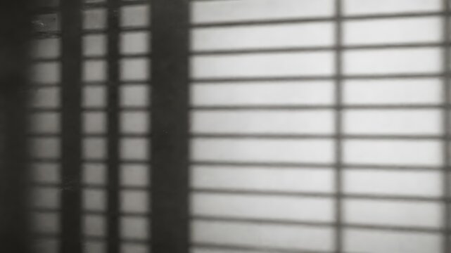 Minimalist interior wall background with window shutter shadow pattern design sunlight background minimalist interior architecture