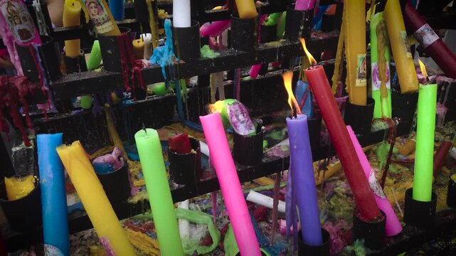 Simala Shrine - Burning Colourful Pray Candles - Catholic Church and Monastery of Holy Eucharist in Sibonga Village - Cebu City Region - Philippines Landmarks - Rainy Day - VCU 4K UHD