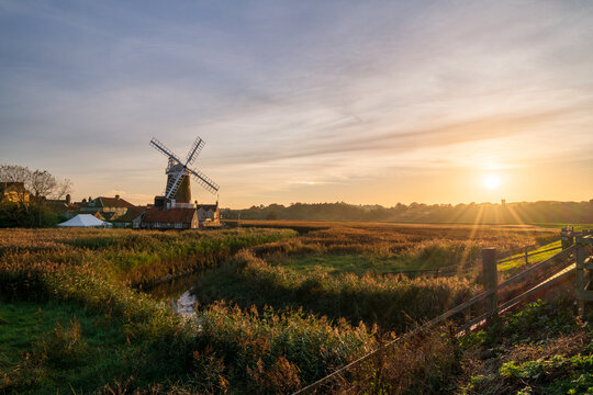 Cley Windmill at sunset in the village of Cley, Norfolk, UK