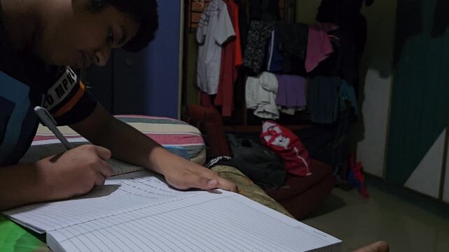 Young Student Studying at Home, Boy Writing Homework in Notebook at Desk, School Education and Learning Concept, Child Doing Schoolwork, Academic Preparation, Home Study and Student Lifestyle