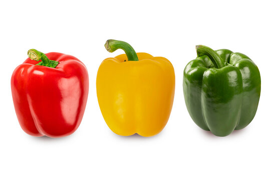 Vibrant group of three fresh organic bell peppers in red, yellow, and green colors isolated onm white background studio shot perfect for healthy cooking, nutrition, and fresh produce concepts.