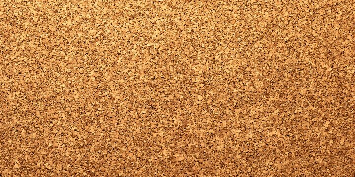 Closeup view of a textured surface resembling cork or granular earth