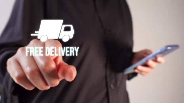 Person holds phone, taps screen with finger. Hand points at floating delivery icon. Text reads 'FREE DELIVERY' in white. Ideal for e-commerce