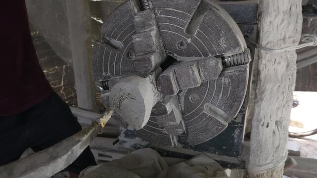 Traditional Artisan Making Granite Stone Utensil on Lathe Machine, Handcrafted Stone Bowl Manufacturing, Indian Stone Craftsmanship, Natural Granite Carving, Traditional Industry and Skilled Artisan