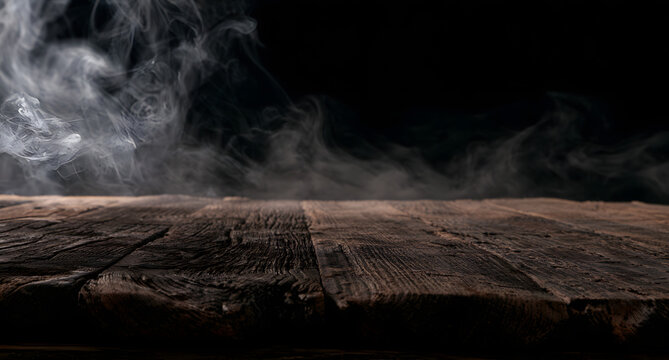 A dark background featuring an old wooden table top with subtle smoke.