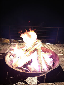 Warm Firelight From a Bonfire on a Chilly Mountain Evening