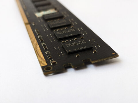 Closeup of RAM memory module isolated on clean white background with copy space. Essential photo for PC hardware  memory upgrade  and tech concept.