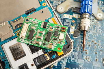 Fototapeta premium Repairing and upgrade mobile phone, electronic, computer hardware and technology concept.