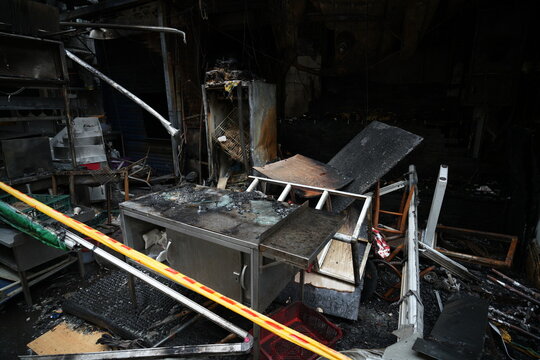 A burnt food stall ruined completely after a fire accident.