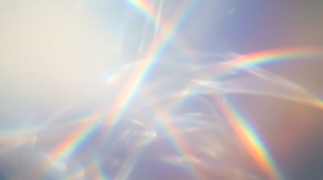 Abstract prism light refraction creating colorful rainbow spectrum patterns on soft blurred neutral background surface with abstract composition prismatic