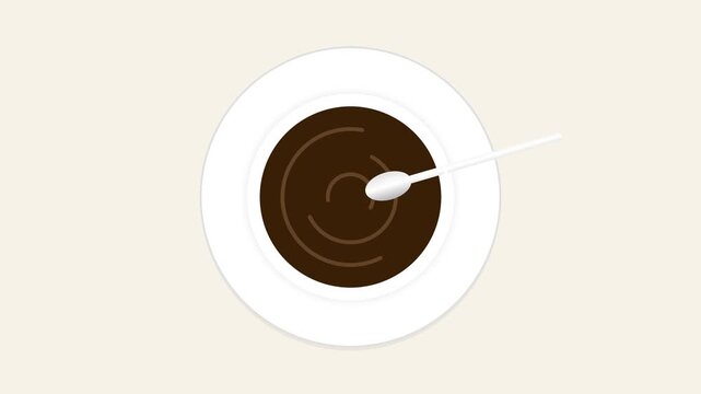 Top view of a cup of black coffee with a spoon on a white saucer.