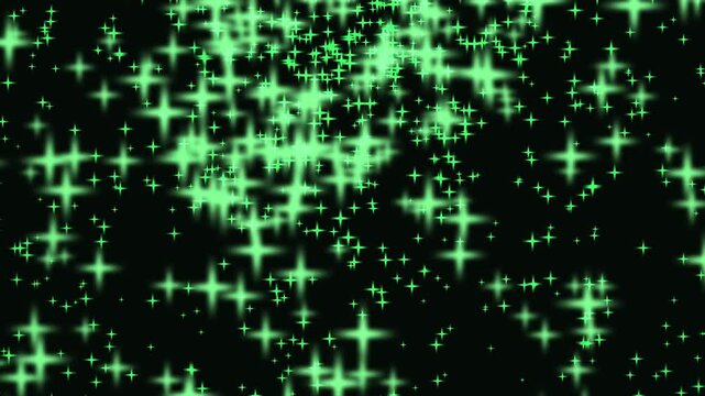Sparkling green particles drift upwards against a black background in a cinematic motion with copy space
