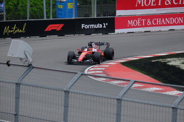 Fototapeta premium May 24, 2025, Montreal, Canada, Charles Leclerc drives Ferrari F1 car at Circuit Gilles Villeneuve. g.