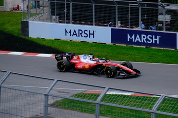 Fototapeta premium May 24, 2025, Montreal, Canada, Charles Leclerc drives Ferrari F1 car at Circuit Gilles Villeneuve. g.