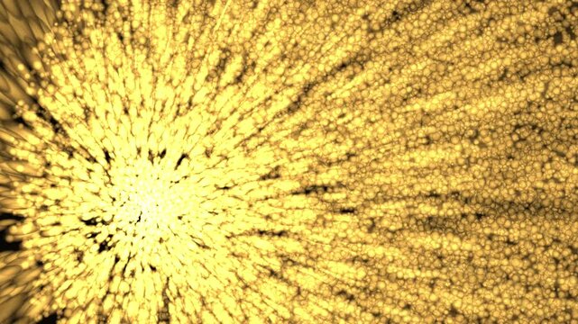 Golden particles exploding outward in a dark void with cinematic motion and luminous energy