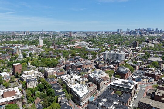 Aerial view of Cambridge and Harvard University with historic churches and Boston skyline, Massachusetts, USA. g.