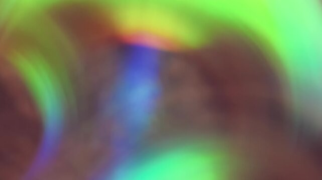 Blur visual glint. Lens flare. Vivid green blue colorful radiant optical illuminated flash leak on abstract luminous art background.