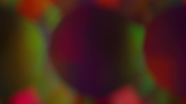 Blur glint circle. Flicker spark. Defocused green red neon multicolor shine lens flare glare gleam glow on abstract art modern background.