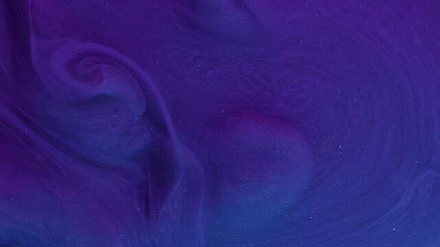 Ink water drop. Paint fog. Defocused blue purple color glitter cloud pigment splash acrylic mist spreading on abstract art background.
