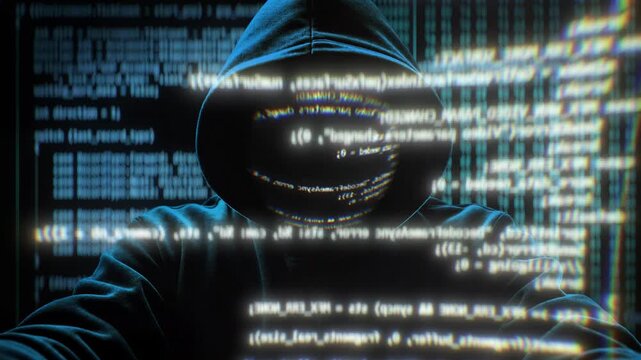 Anonymous Hacker Writing Code on Computer Screen Cyber Crime Data Encryption Security System. Big Technical Attack on Server Connection Network Internet Software Program Technology Digital Concept 4k