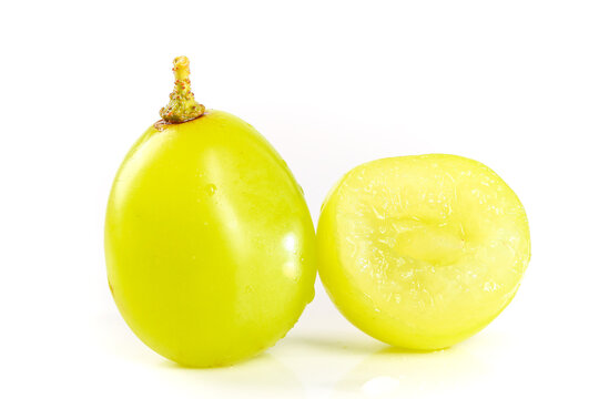 Fresh Green Seedless Grapes Whole and Half Cut Isolated on White Background
