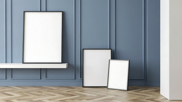 Blank picture frames mockup leaning against a classic blue paneled wall