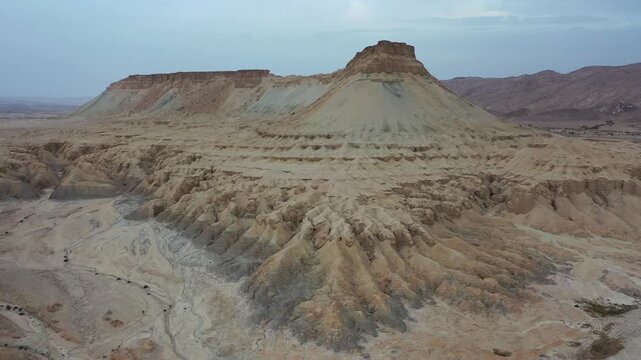 Aerial view of the arid rocky terrain and desert formations of Mount Zin in the Negev desert near Yeruham, South District, Israel.