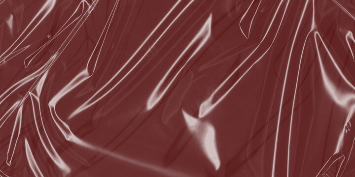 Crumpled plastic texture on dark red background, wrinkled cellophane wrap overlay, glossy synthetic film with highlights