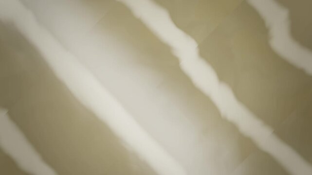 Abstract yellow background with moving diagonal white stripe pattern loop 4K