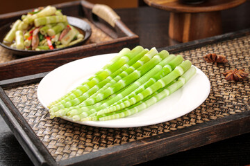 Fresh Green Bamboo Shoots on White Plate - Asian Vegetable Cooking Ingredients © LeThi