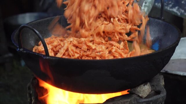 Crispy namkeen deep frying in traditional kadai