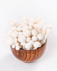 Fresh White Edible Mushrooms in Wooden Bowl - High Quality Yunnan Fungi Ingredient © NguyenVan