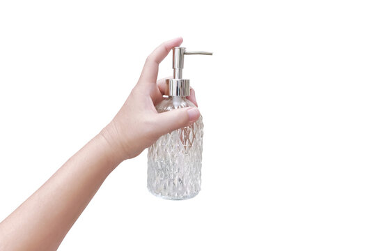 A clear glass perfume bottle with a diamond pattern held in hand PNG transparent.