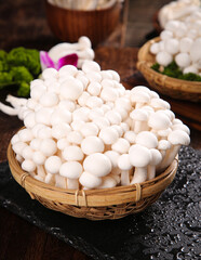 Fresh White Edible Mushrooms from Yunnan in Bamboo Basket - Organic Fungi Ingredients © NguyenVan