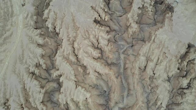 Aerial view of the rugged terrain and deep canyons of Mount Zin in the Negev desert near Yeruham, South District, Israel.