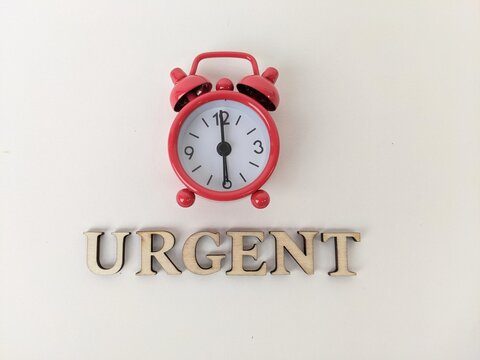 Urgent reminder symbolized by alarm clock, emphasizing immediate attention and critical importance. Business concept background, business object and metaphor.