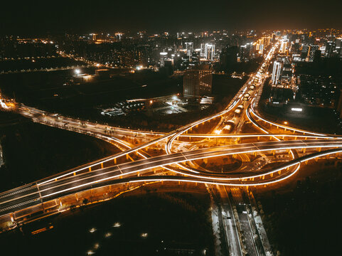 Night City Overpass Aerial View with Highway Lights