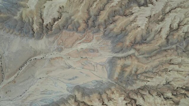 Aerial view of the arid landscape and geological formations of Mount Zin in the Negev desert near Yeruham, South District, Israel.