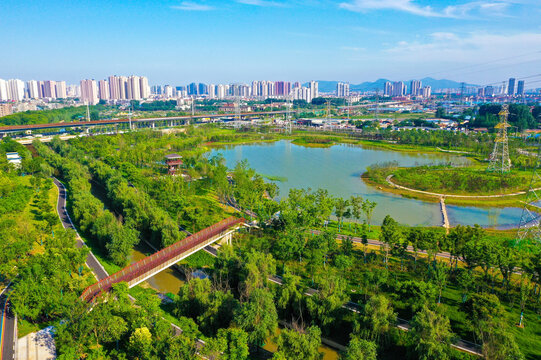 Xiangyang City Park Aerial View with Sponge Pathway and Urban Skyline