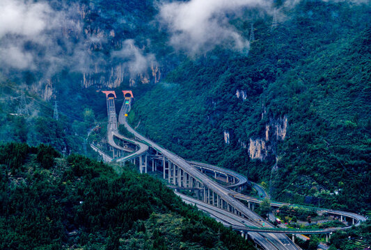 Xinping Mountain Overpass Among Clouds and Deep Forest